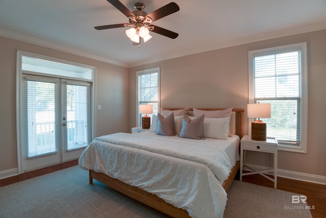 bedroom with access to exterior, ceiling fan, french doors, dark hardwood / wood-style floors, and crown molding