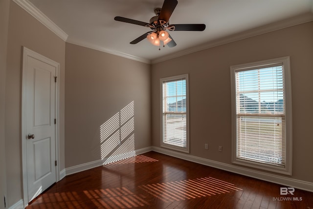 unfurnished room with crown molding, ceiling fan, and dark hardwood / wood-style flooring