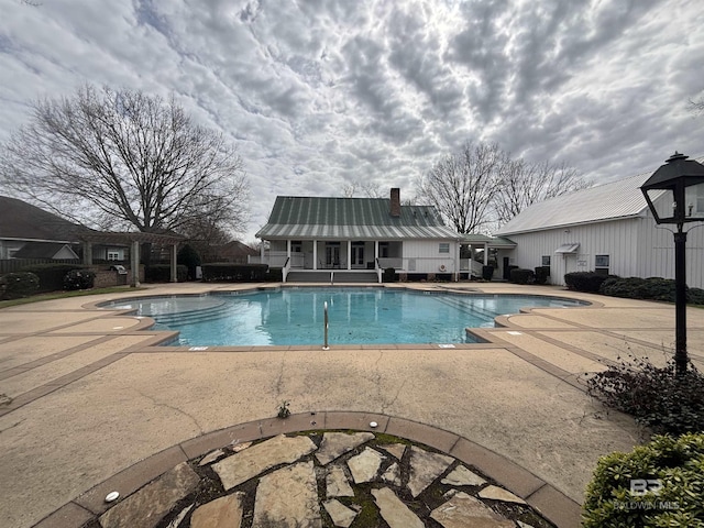 view of pool with a patio