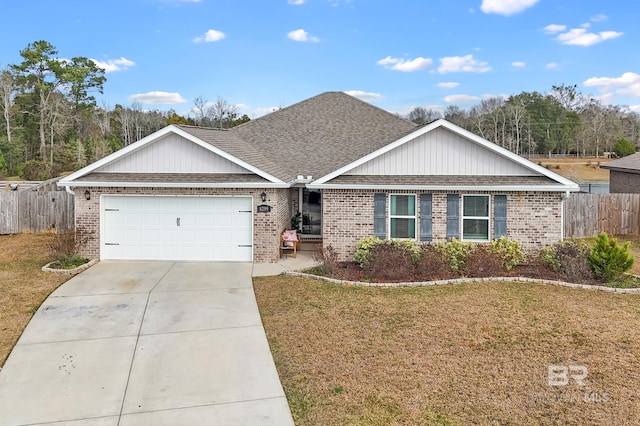 ranch-style home with a garage and a front yard