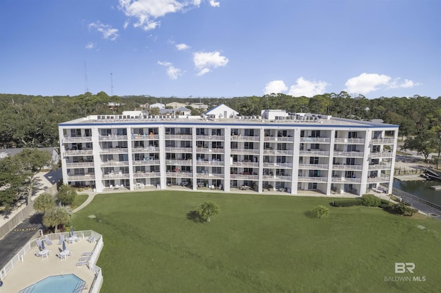 view of building exterior featuring a water view