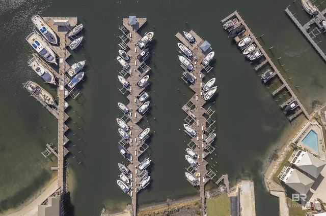 birds eye view of property featuring a water view