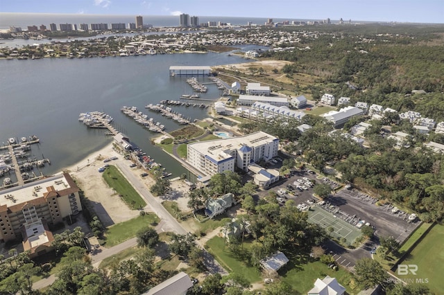 birds eye view of property with a water view