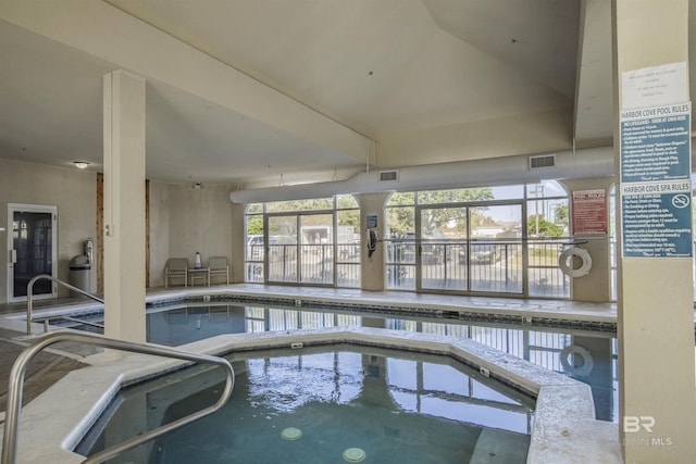 view of pool with an indoor in ground hot tub