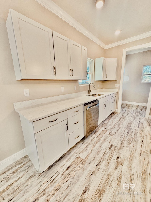 kitchen with white cabinetry, dishwasher, sink, crown molding, and light hardwood / wood-style flooring