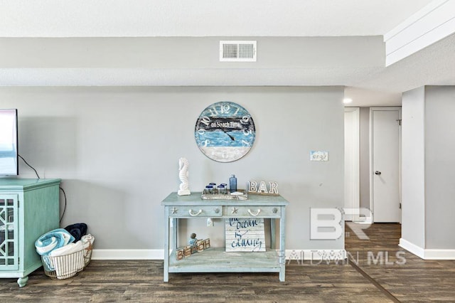 interior details with hardwood / wood-style flooring