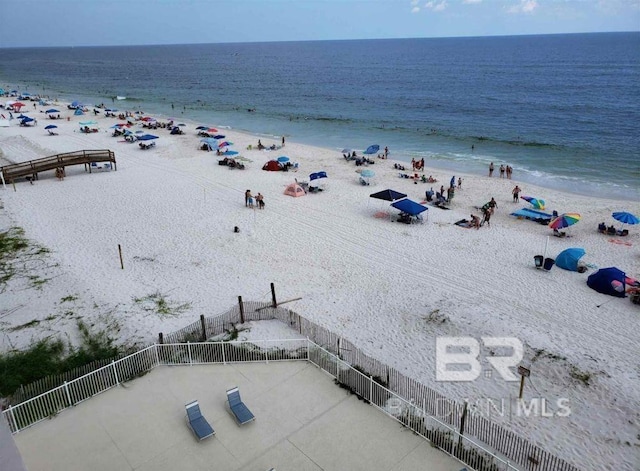 property view of water featuring a beach view