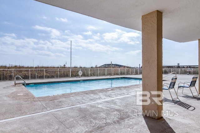 view of pool with a patio area