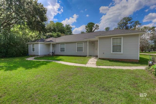 ranch-style house featuring a front lawn