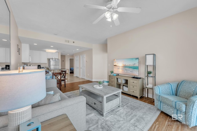 455 E Beach Blvd Unit 511, Gulf Shores, AL 36542 - living area with baseboards, recessed lighting, ceiling fan, and light wood-style floors