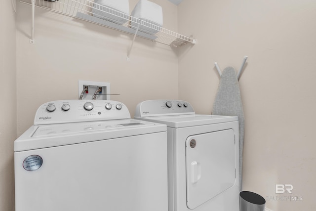 455 E Beach Blvd Unit 511, Gulf Shores, AL 36542 - laundry area featuring independent washer and dryer and laundry area