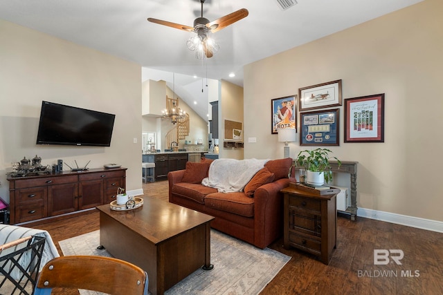 4001 Landfall Dr, Pensacola, FL 32507 - living area featuring visible vents, baseboards, ceiling fan, wood finished floors, and vaulted ceiling