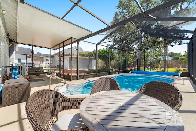 4001 Landfall Dr, Pensacola, FL 32507 - view of swimming pool featuring a fenced in pool, an outdoor structure, outdoor lounge area, a fenced backyard, and a patio