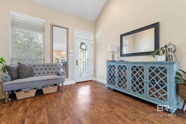 4001 Landfall Dr, Pensacola, FL 32507 - foyer with baseboards, lofted ceiling, and wood finished floors