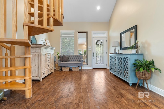 4001 Landfall Dr, Pensacola, FL 32507 - foyer entrance featuring baseboards, dark wood-style floors, and high vaulted ceiling