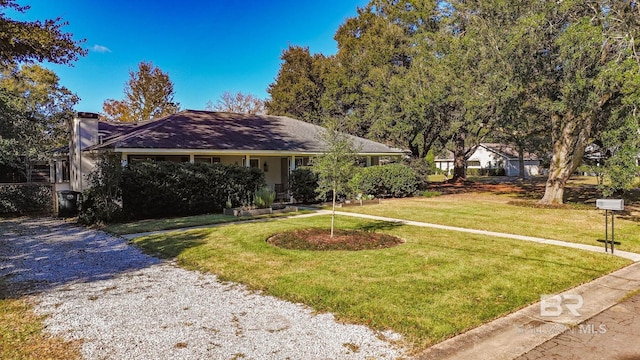 view of front of home with a front yard