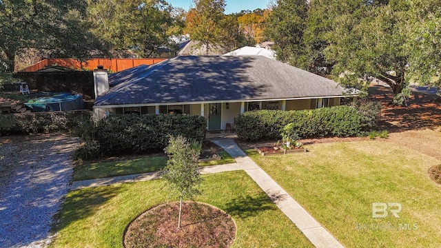 view of front of home with a front lawn