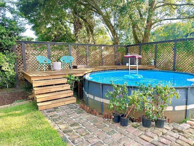 view of pool with a deck