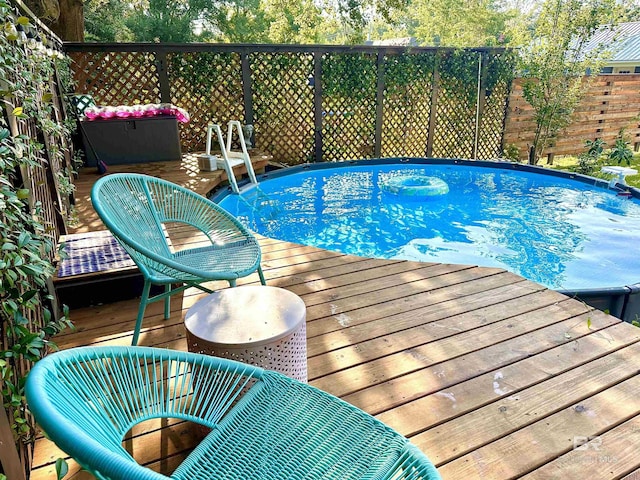 view of pool with a deck