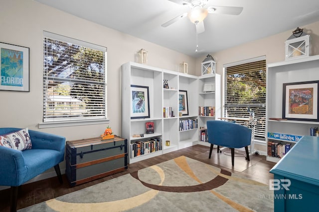 office with ceiling fan and hardwood / wood-style flooring