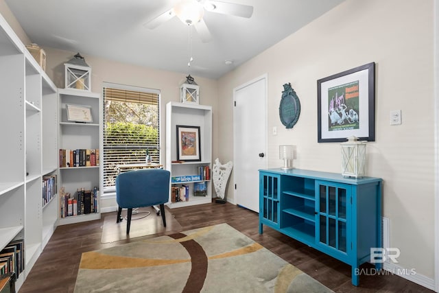 office space featuring dark hardwood / wood-style flooring and ceiling fan