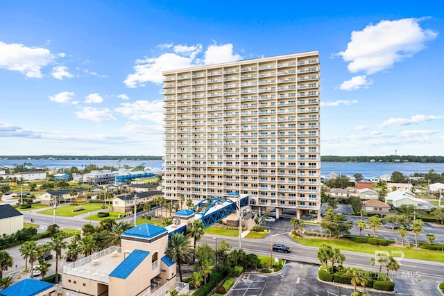 view of building exterior featuring a water view