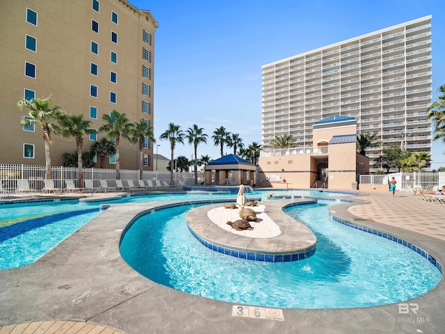 view of pool featuring a patio area