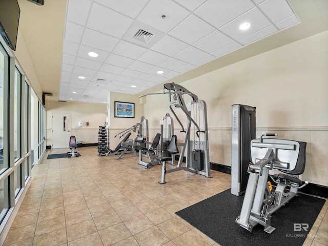 workout area with a drop ceiling