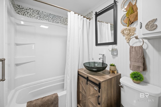 full bathroom featuring toilet, vanity, crown molding, and shower / bath combination with curtain