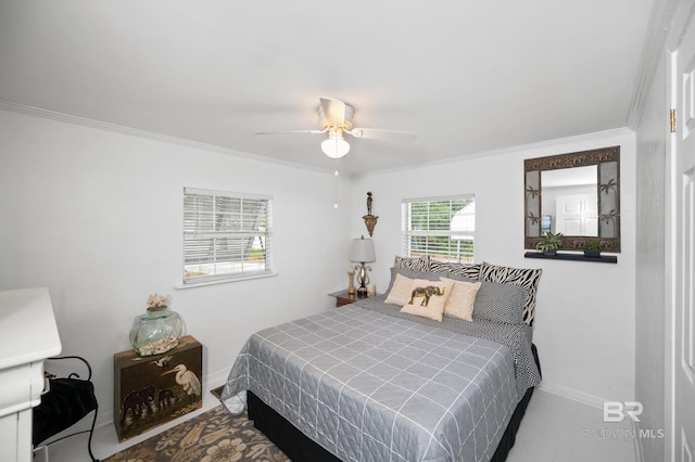 bedroom featuring ceiling fan and crown molding