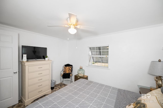 bedroom with ceiling fan and ornamental molding