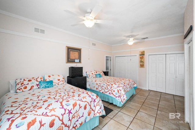 bedroom featuring ceiling fan, light tile patterned floors, and ornamental molding