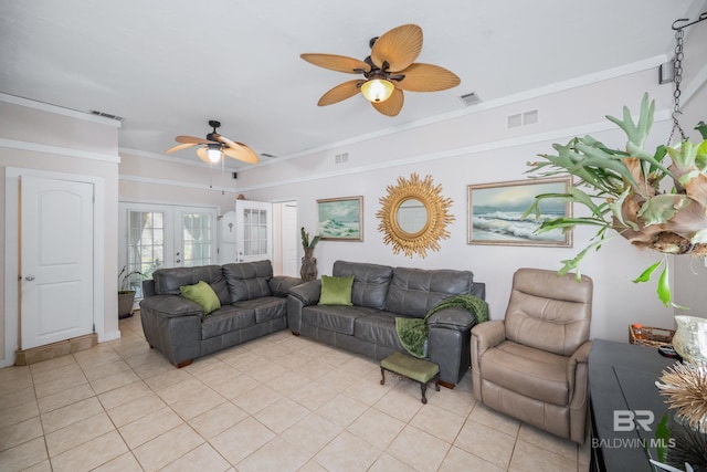 living room with ceiling fan, french doors, light tile patterned flooring, and ornamental molding