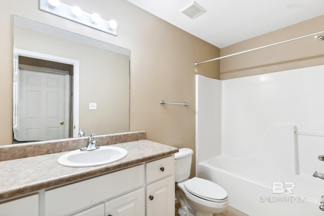 full bathroom with shower / bathing tub combination, vanity, and toilet