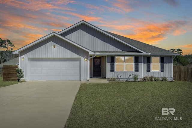 single story home with an attached garage, fence, driveway, roof with shingles, and a lawn