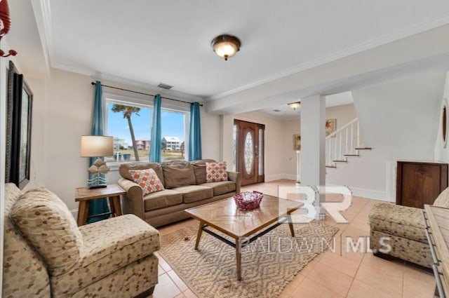 2223 W Beach Blvd, Gulf Shores, AL 36542 - living room with stairs, baseboards, ornamental molding, and light tile patterned floors