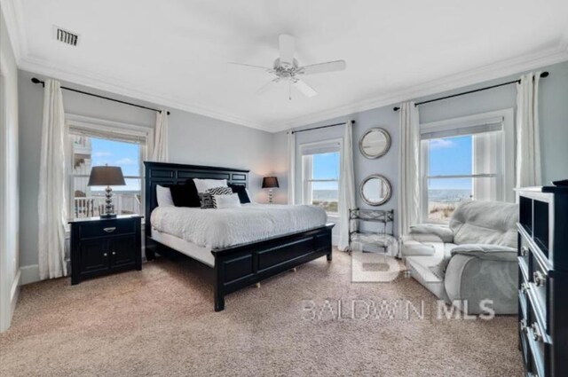 2223 W Beach Blvd, Gulf Shores, AL 36542 - bedroom featuring crown molding, multiple windows, and visible vents