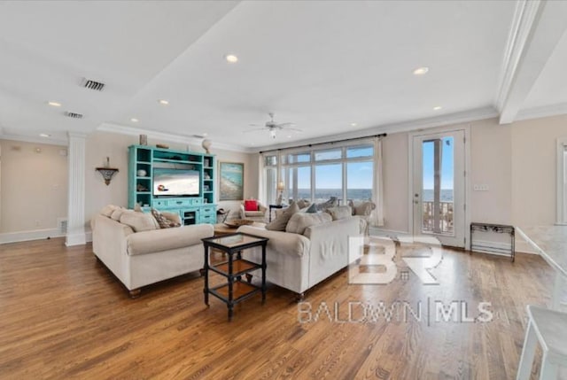 2223 W Beach Blvd, Gulf Shores, AL 36542 - living room featuring crown molding, wood finished floors, visible vents, ceiling fan, and recessed lighting