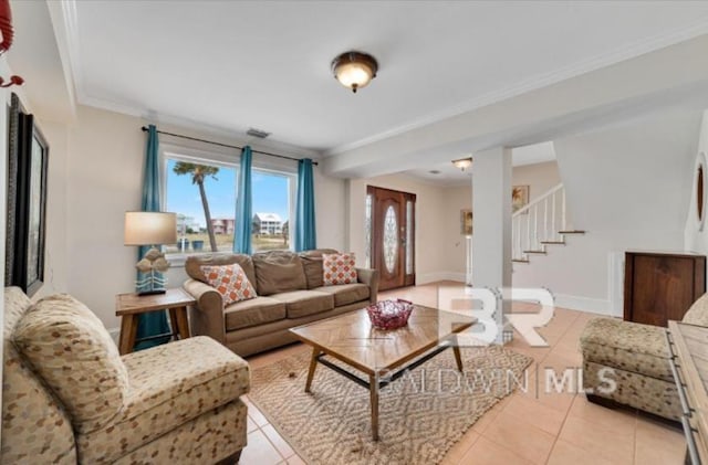 2223 W Beach Blvd, Gulf Shores, AL 36542 - living area with stairs, crown molding, and light tile patterned floors
