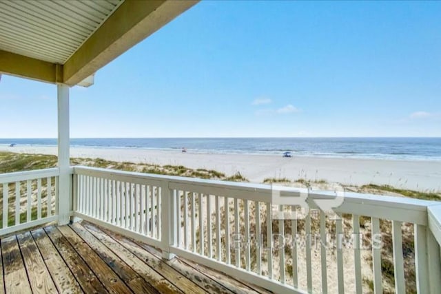 2223 W Beach Blvd, Gulf Shores, AL 36542 - wooden terrace featuring a water view and a view of the beach