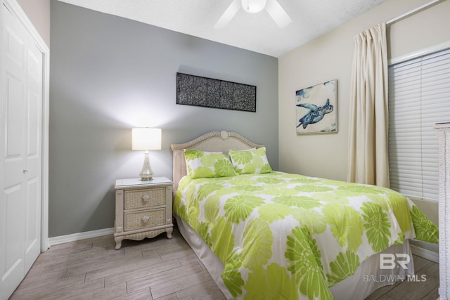 bedroom with a closet and ceiling fan