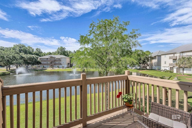4 Yacht Club Dr Unit 15, Daphne, AL 36526 - wooden deck featuring a water view, a lawn, and a residential view