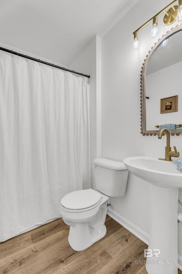 4 Yacht Club Dr Unit 15, Daphne, AL 36526 - full bathroom with wood finished floors, toilet, and baseboards