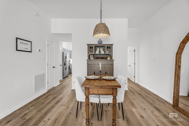 4 Yacht Club Dr Unit 15, Daphne, AL 36526 - dining area with light wood-style floors and baseboards