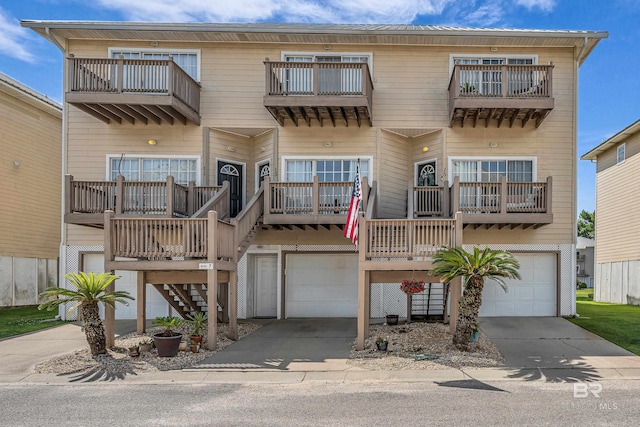 4 Yacht Club Dr Unit 15, Daphne, AL 36526 - view of front of house with stairs, a garage, and driveway