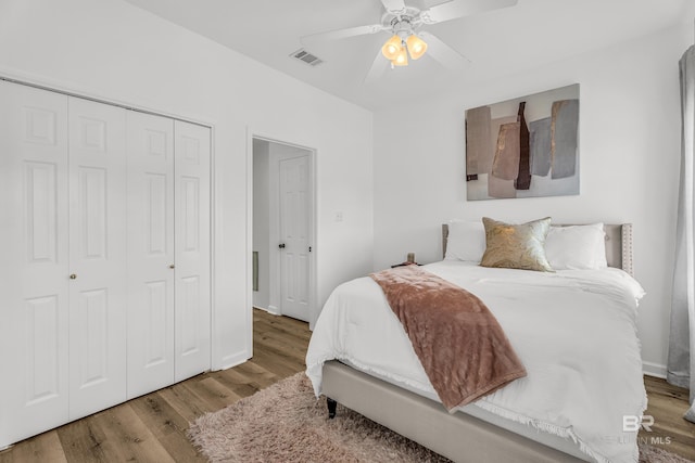 4 Yacht Club Dr Unit 15, Daphne, AL 36526 - bedroom featuring wood finished floors, a closet, and a ceiling fan