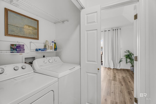 4 Yacht Club Dr Unit 15, Daphne, AL 36526 - laundry room with washing machine and dryer and light wood-style flooring