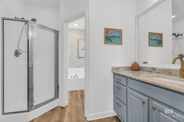 4 Yacht Club Dr Unit 15, Daphne, AL 36526 - full bath featuring a stall shower, wood finished floors, vanity, and a bath