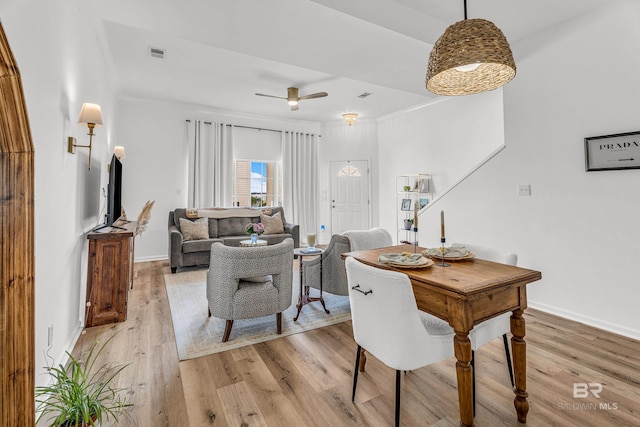 4 Yacht Club Dr Unit 15, Daphne, AL 36526 - dining space featuring ceiling fan, light wood-type flooring, baseboards, and crown molding
