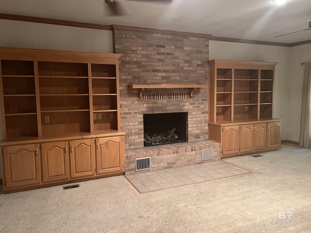 unfurnished living room featuring light carpet, a fireplace, and ornamental molding